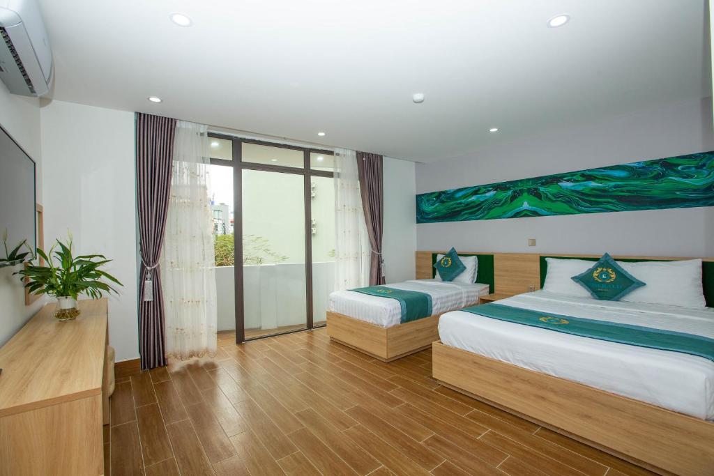 Двухместный (Двухместный номер Делюкс с 2 отдельными кроватями), Emerald Hotel Cát Bà