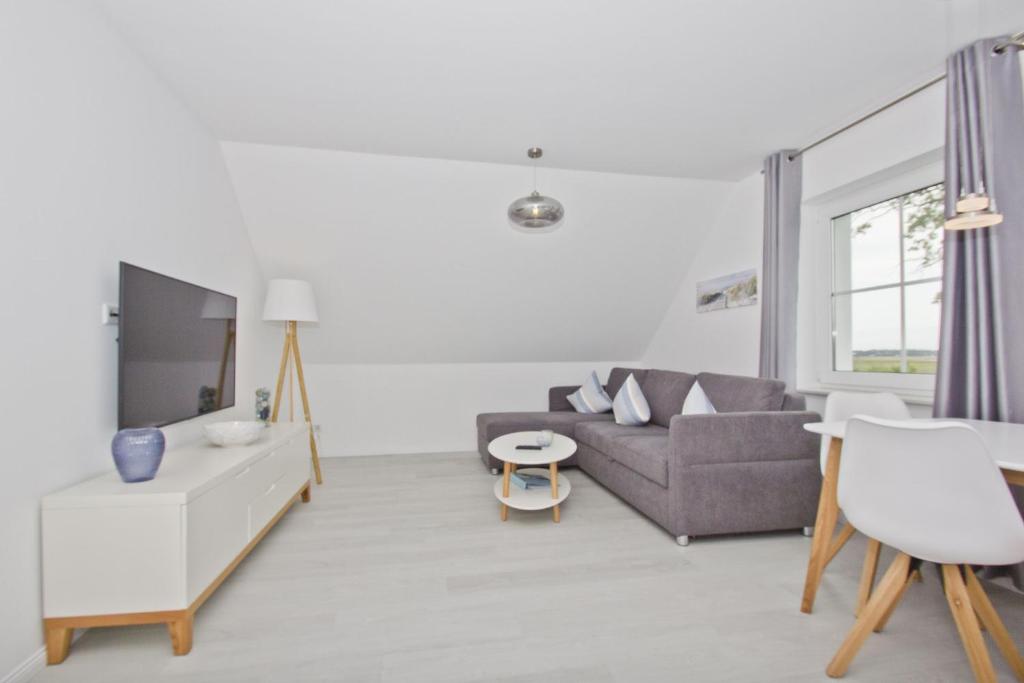 moderne Ferienwohnung mit Gartennutzung - Haus Inselwind FeWo MEERbucht photo 4