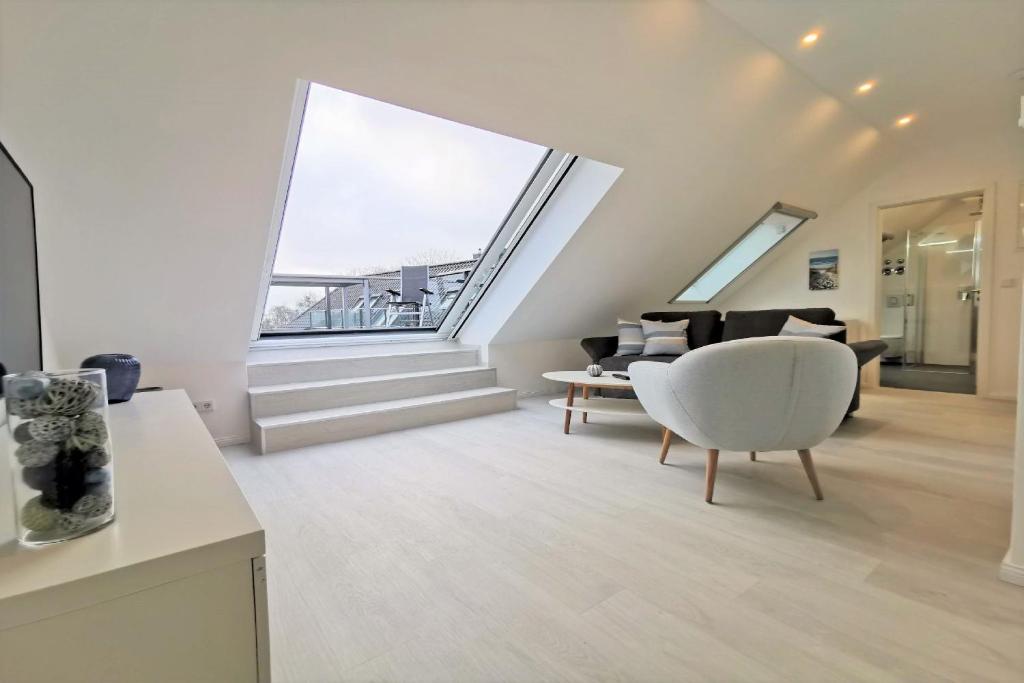 Ferienwohnung mit Dachterrasse und Meerblick - Haus Inselwind FeWo MEERwasser photo 4