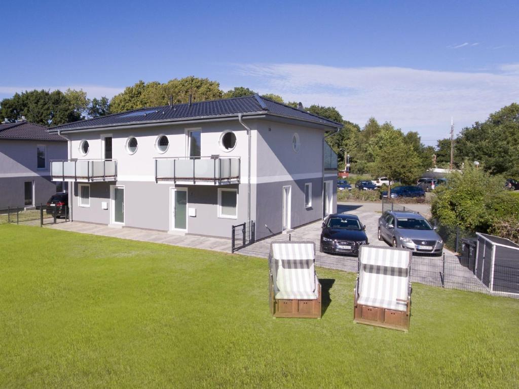 strandnah, Balkon, Meerblick, Sauna, gratis Nutzung vom AHOI Erlebnisbad und Sauna in Sellin - Beach House Schotstek photo 1