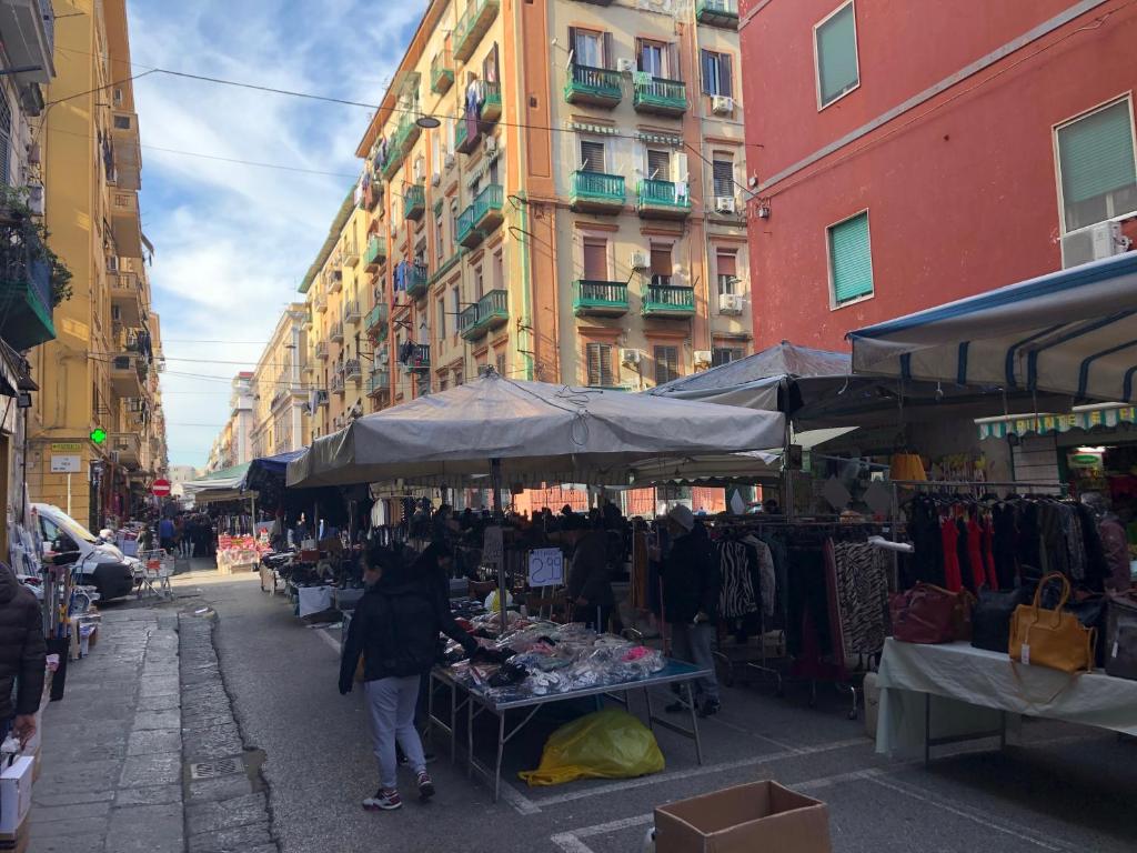 The Quality Apartment Napoli - Tap to explore photos