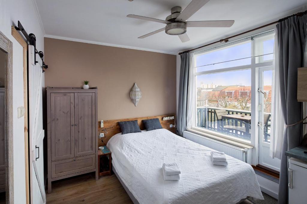 Guest House Aquarius Room Type - Small Room with Balcony