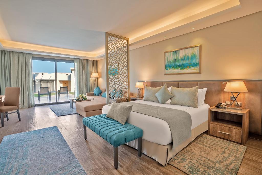 Сьюит (Люкс с кроватью размера «king-size» и видом на сад), Rixos Premium Magawish Suites and Villas