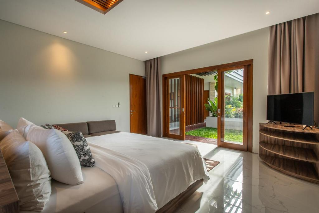 The Amarta Villa - Tap to explore photos
