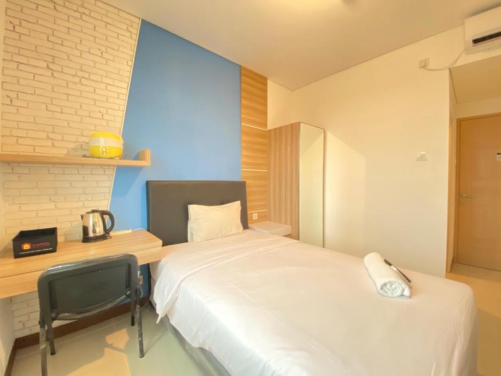 Comfortable Studio Semi Apartment at The Lodge Paskal near BINUS University By Travelio photo 3
