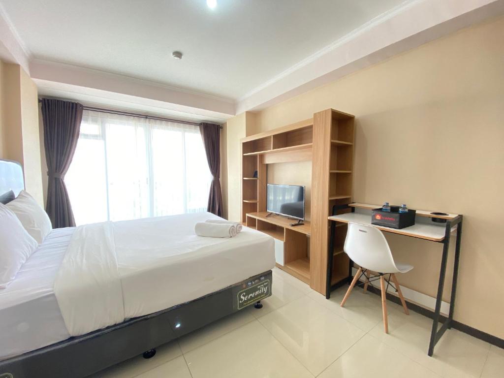 Sunnyside Studio Room at Apartment Gateway Pasteur near Exit Toll Pasteur By Travelio - Tap to explore photos