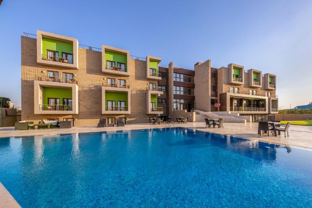 Dhara Residence E2 Lodge Hotel - Tap to explore photos