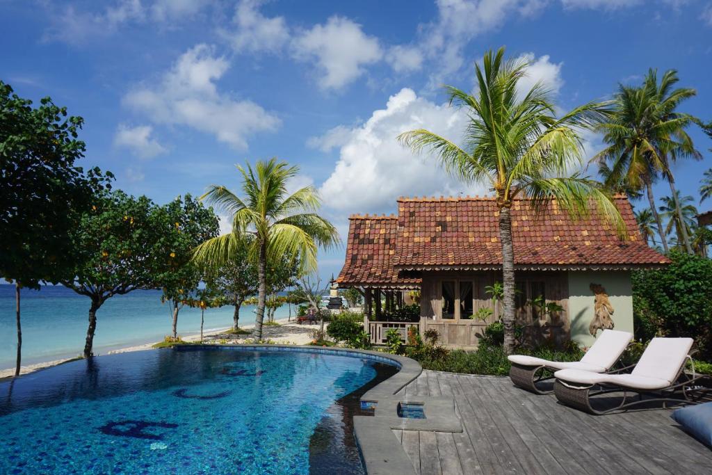 Blue Harbor Beachfront Villas & Resto - Tap to explore photos