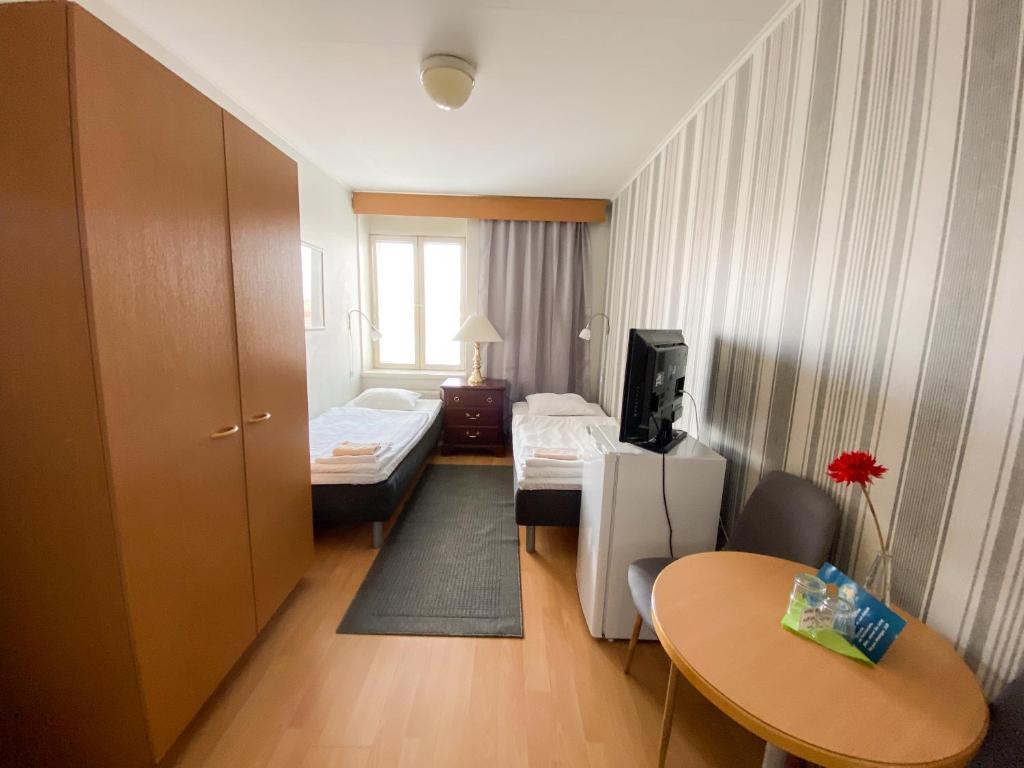 Двухместный (Небольшой двухместный номер с 2 отдельными кроватями), Hotel Merikotka