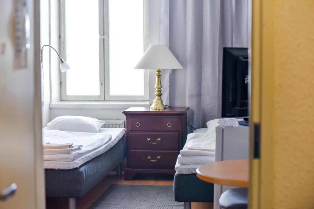 Двухместный (Небольшой двухместный номер с 2 отдельными кроватями), Hotel Merikotka