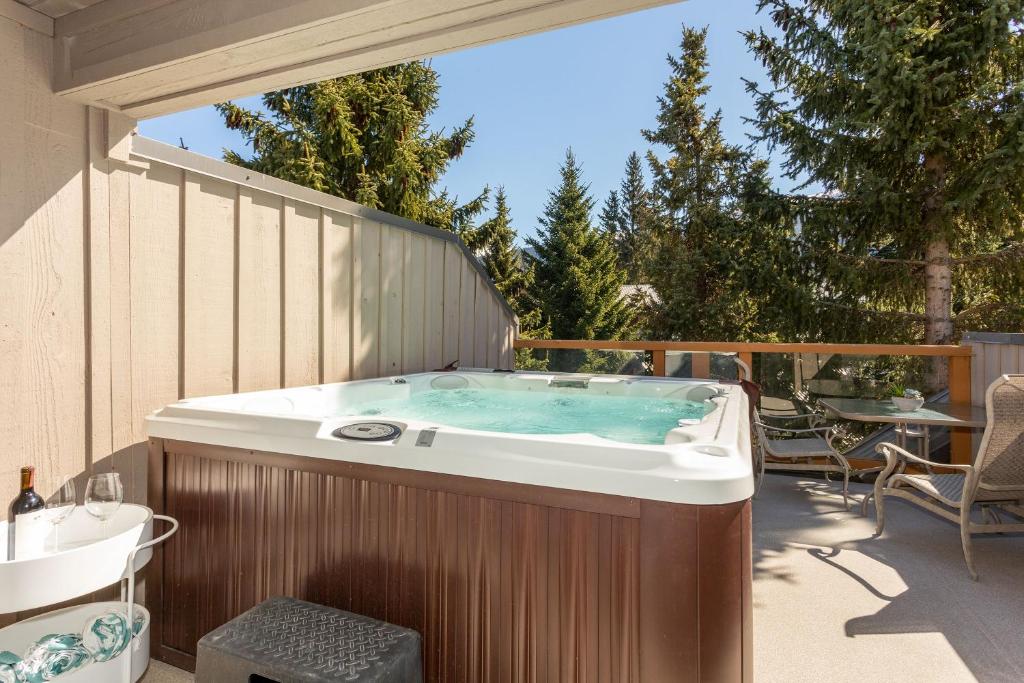 Freshly Reno'd Village Condo with Private Hot Tub photo 2