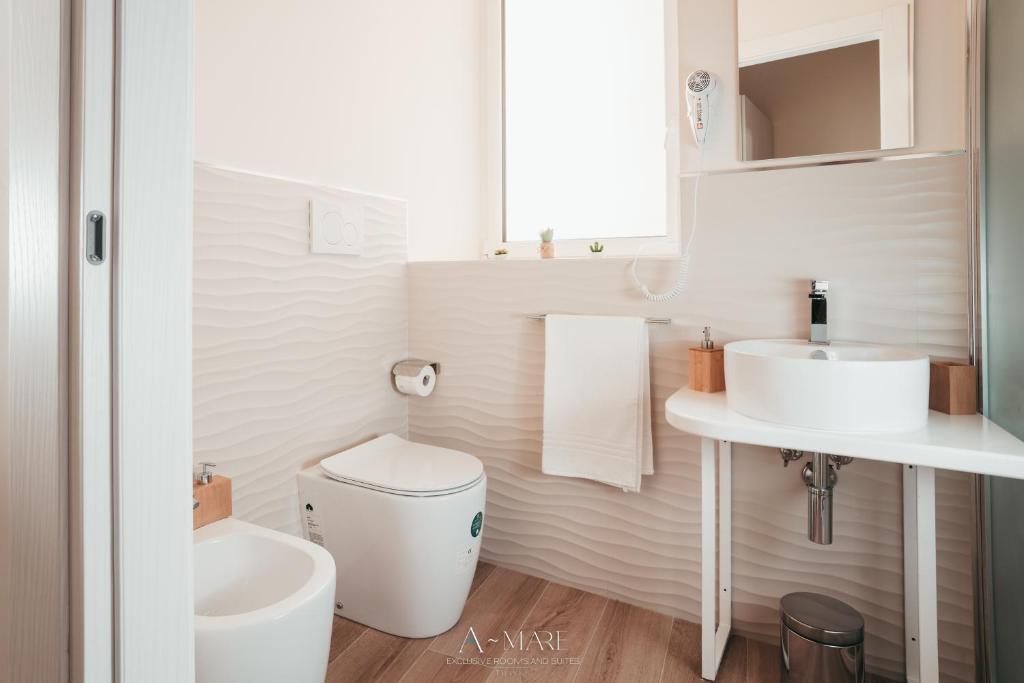 A-mare Exclusive Rooms & Suites - Tap to explore photos