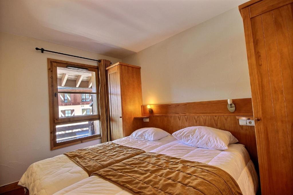 Arc 1950 - Duplex prestige 4 pièces 3 chambres pour 6-8 personnes résidence 5 étoiles Auberge Jérôme au coeur du village photo 3