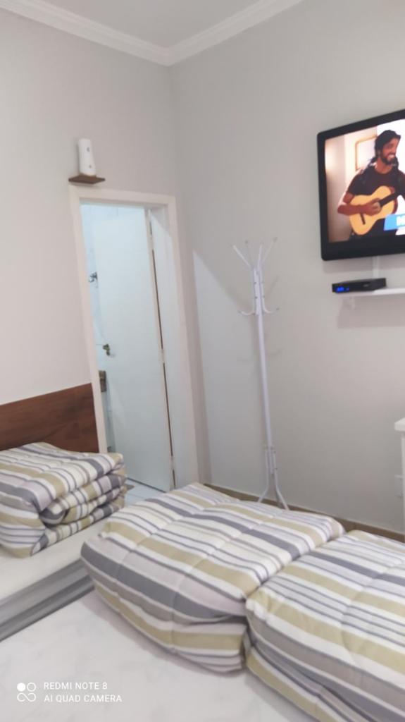 Quarto Familiar com ar,frigobar,wi fi, garagem photo 3