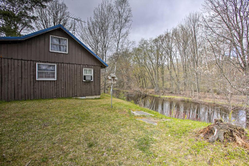 Rustic River View Cabin with Fire Pit, Games and Grill photo 2