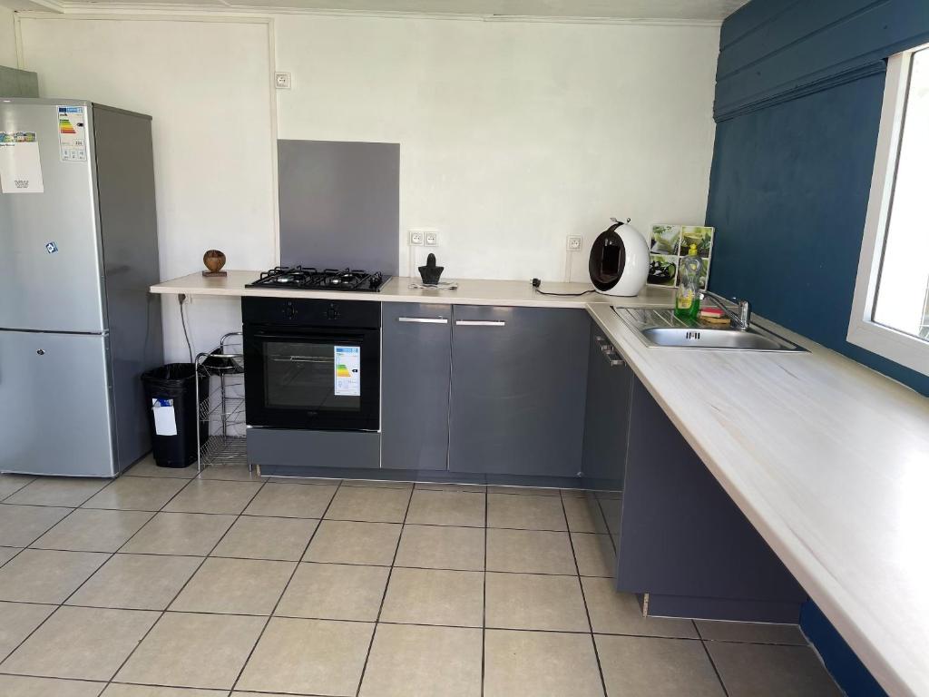 Maison de 2 chambres avec terrasse amenagee et wifi a La Plaine des Cafres photo 1
