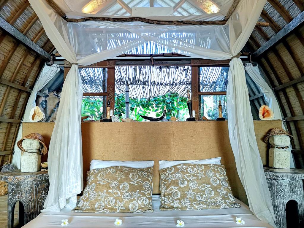 Coconut Garden Beach Resort - Tap to explore photos