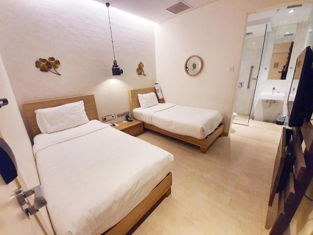 Двухместный (Двухместный номер Делюкс с 2 отдельными кроватями), Hotel Clover 769 North Bridge Road