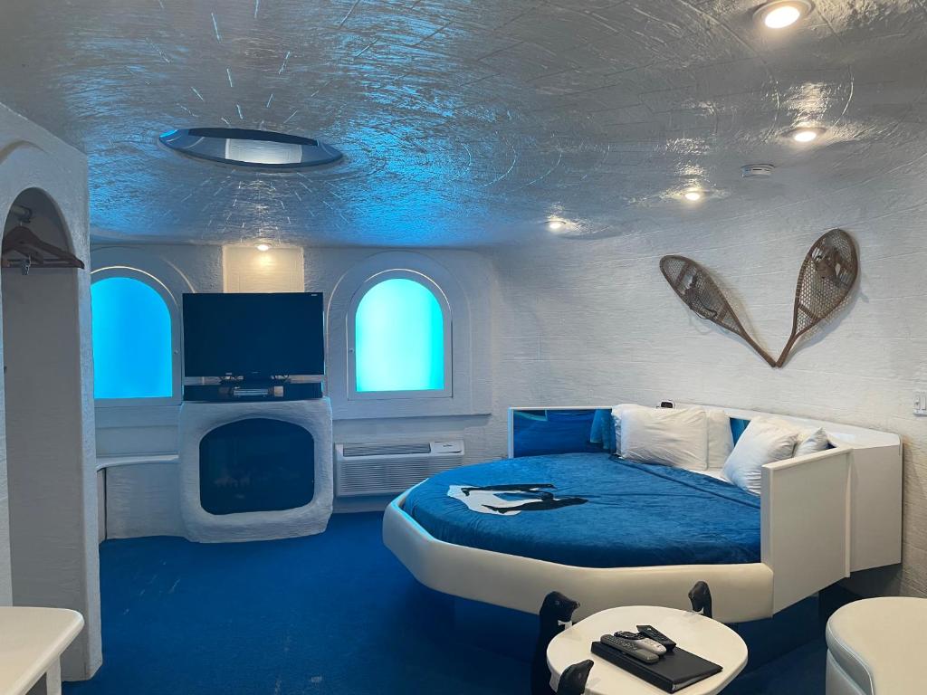 Designer Inn & Suites - Tap to explore photos