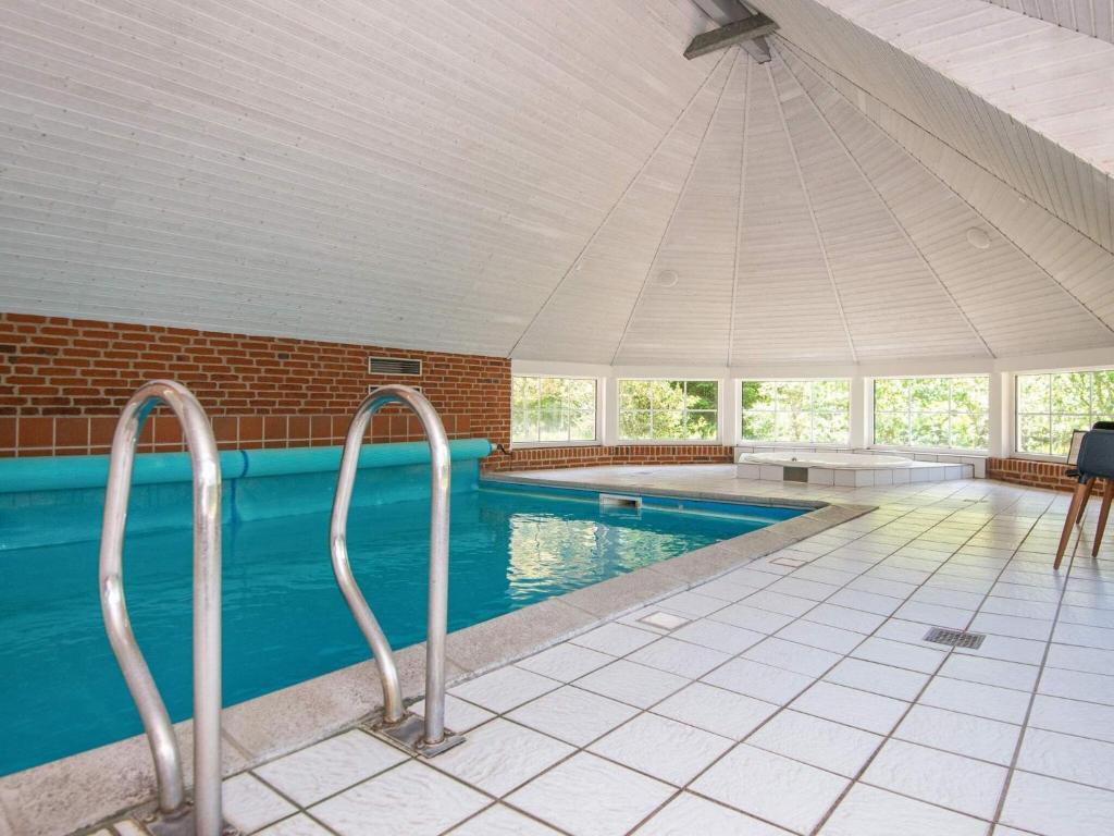 10 person holiday home in R m photo 2