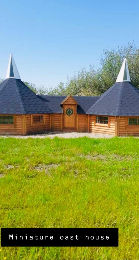 Miniature oast house - Tap to explore photos