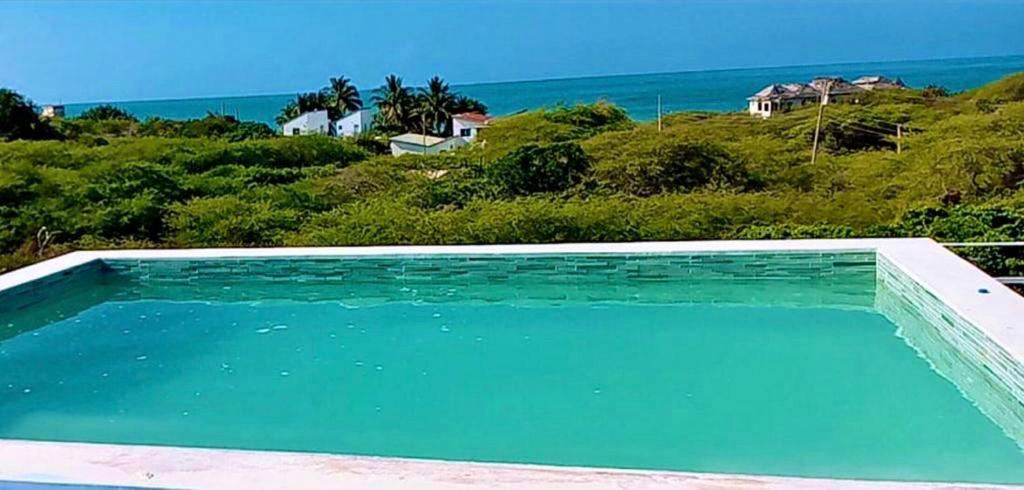 VillaMerissa nestled between two beach, short walk to shopping & entertainment photo 2