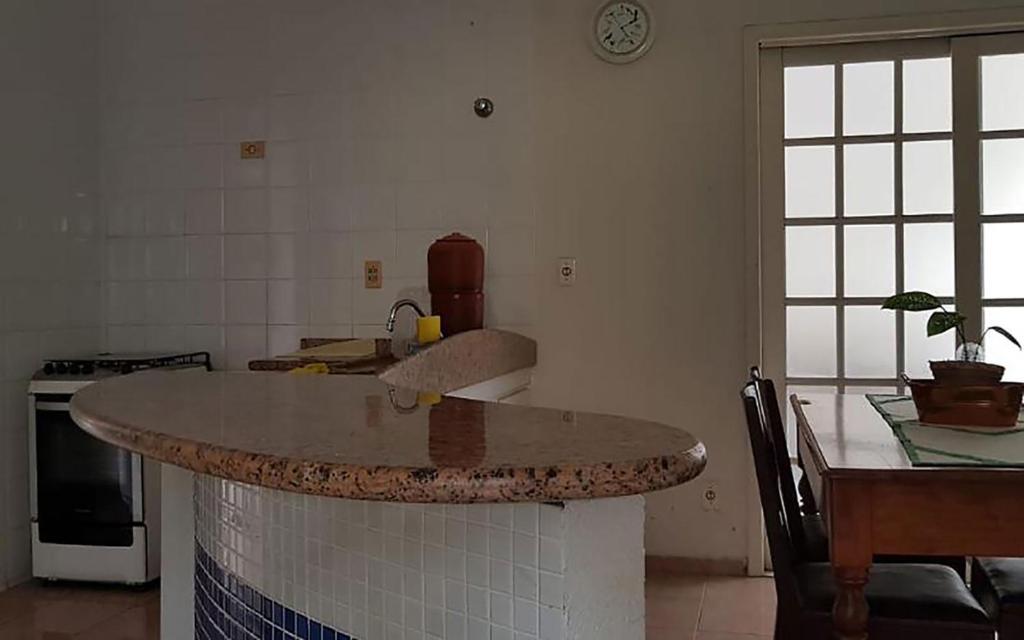 Casa com churrasqueira no Centro de Caraguatatuba photo 4