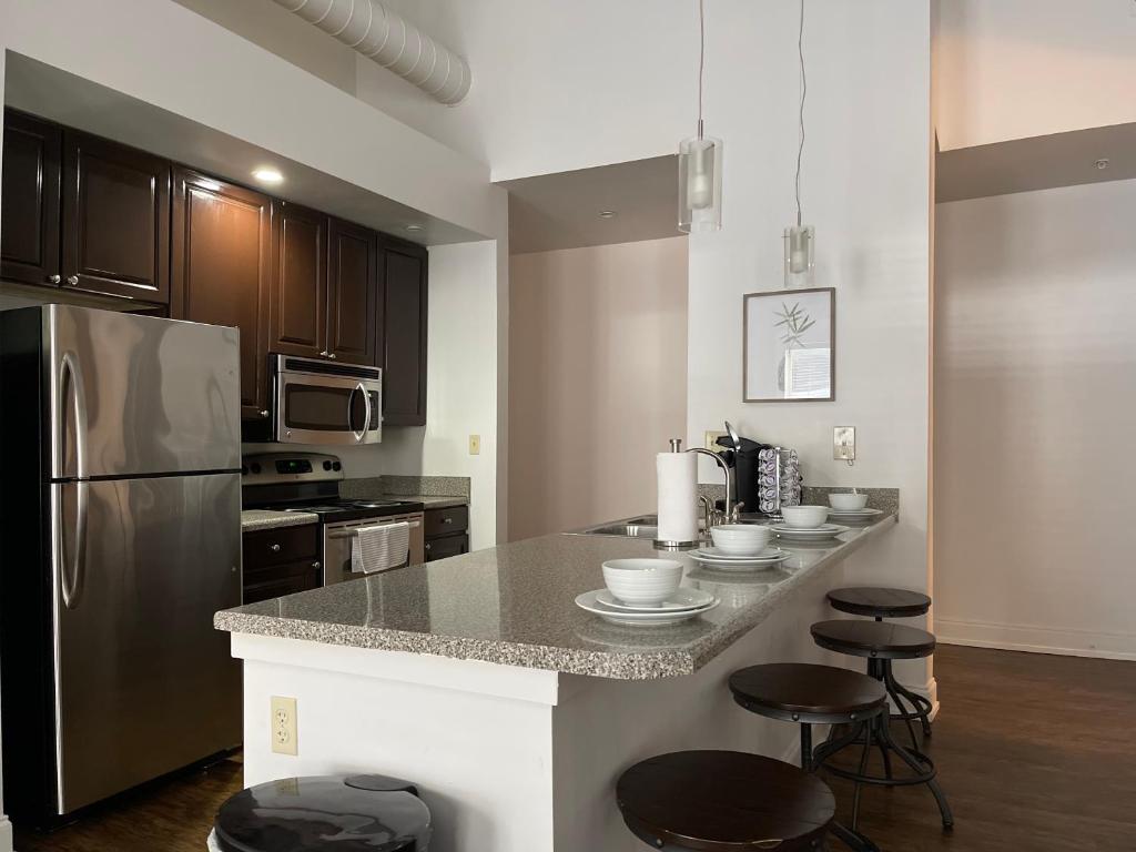 Smart Exposed Brick-Walled Apt Located On Main St.