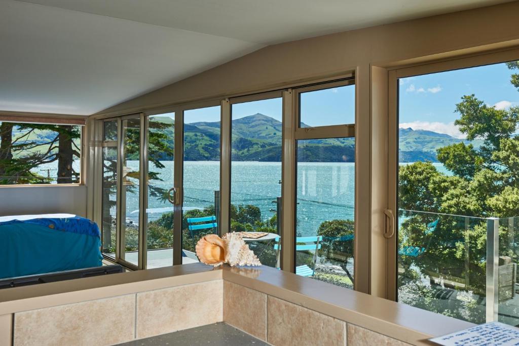 Akaroa on the Beach Apartments - Tap to explore photos