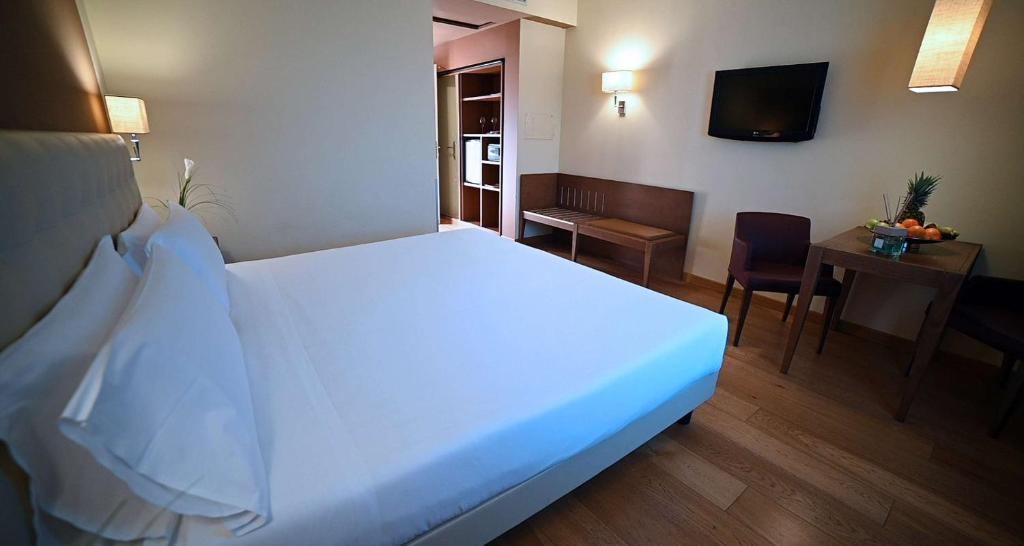 Best Western Grand Hotel Guinigi - Tap to explore photos