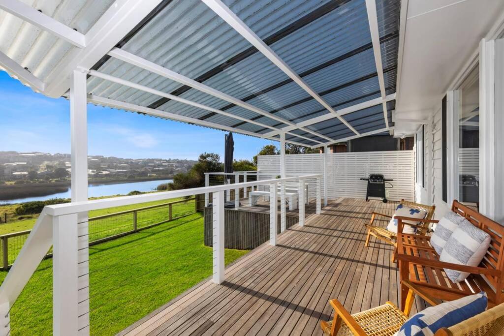 SALTWATER HOUSE - Opposite the beach and views over the lake! photo 1