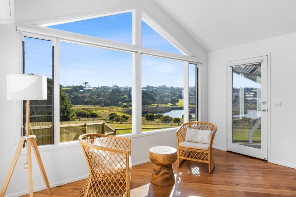 SALTWATER HOUSE - Opposite the beach and views over the lake! photo 2