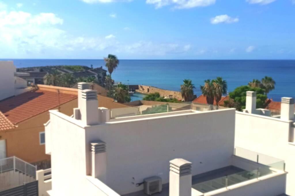 New built corner villa in Isla Plana by the sea photo 2
