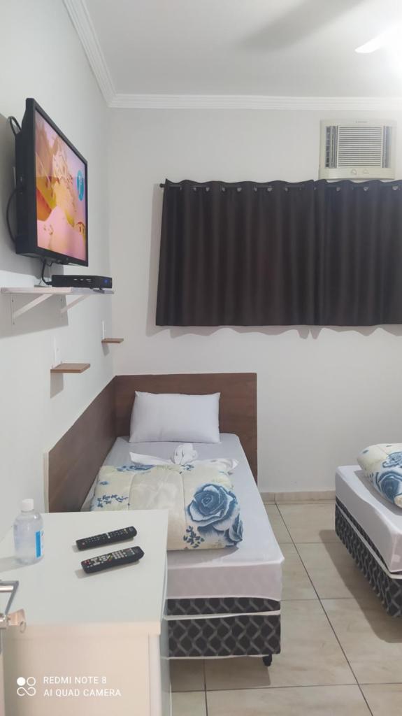 Quarto completo ar,wi fi e garagem gratuita photo 3