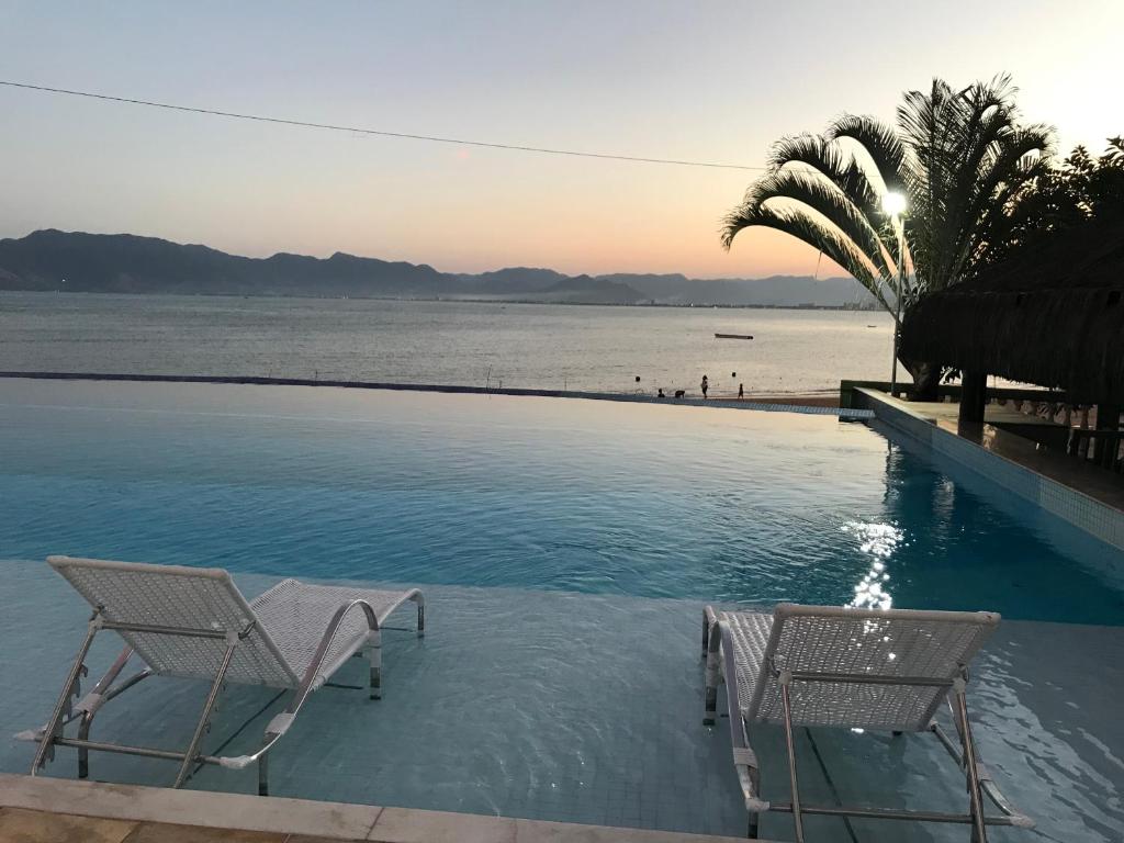 Apartamento pé na areia frente para o Mar e piscina na Prainha photo 1