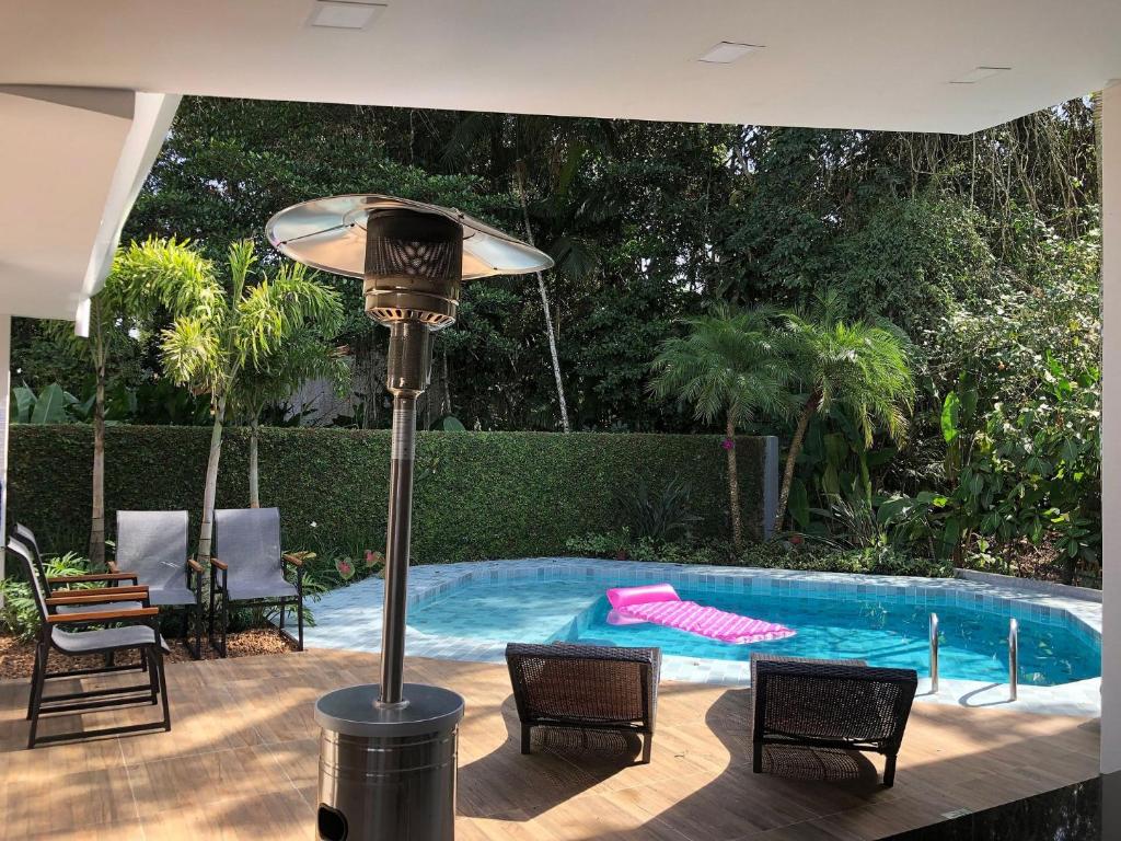 Casa c/ área gourmet e piscina na praia de Riviera