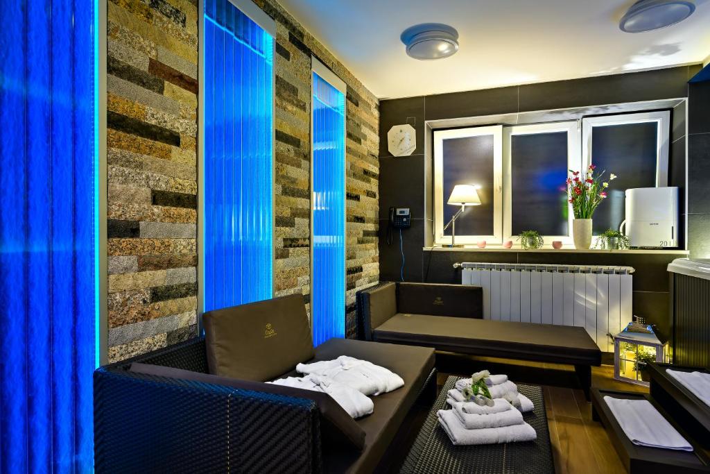Сьюит (Люкс с кроватью размера «king-size» и гидромассажной ванной), Madison Luxury Apartments
