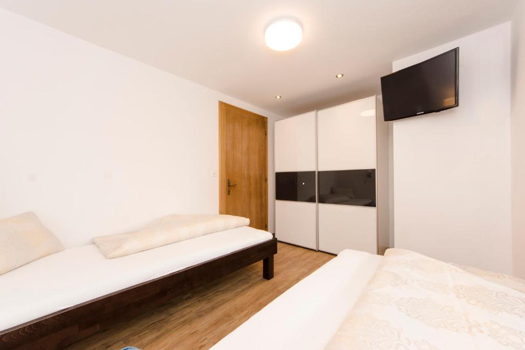 Chasa Sulai Appartements - Tap to explore photos