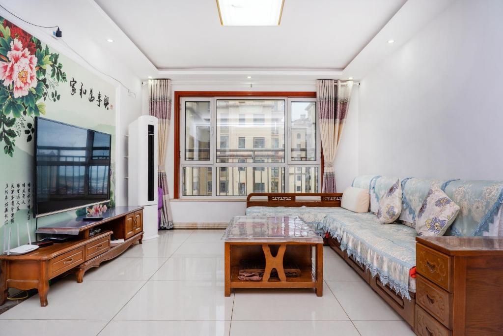 青岛金沙滩全家幸福三居室海景公寓Blessed Family Apartment photo 2