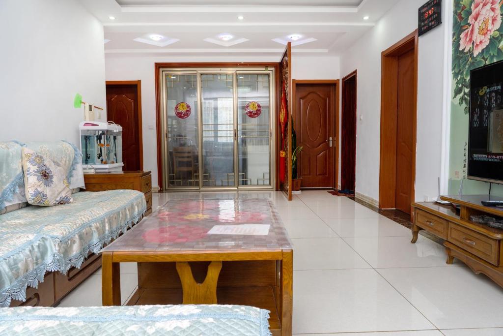 青岛金沙滩全家幸福三居室海景公寓Blessed Family Apartment photo 4