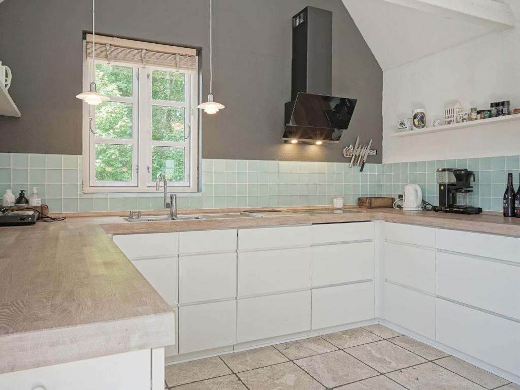 8 person holiday home in R nne photo 2