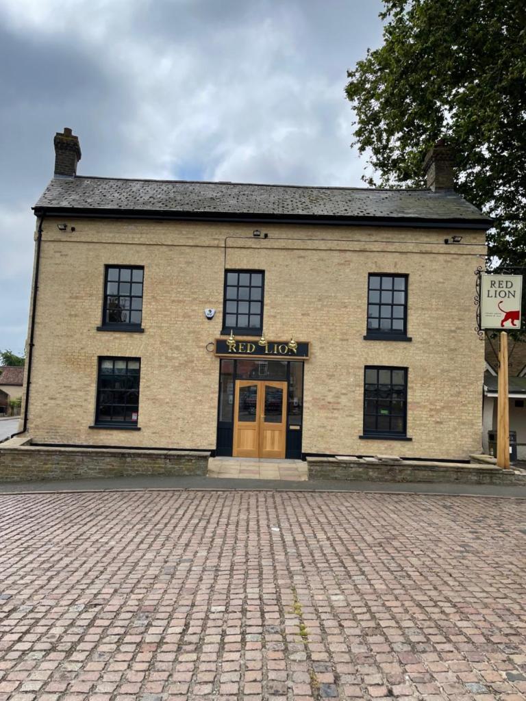 The Red Lion, Stretham - Tap to explore photos