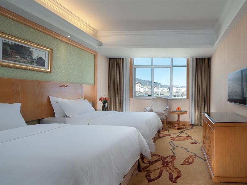 Vienna International Hotel Lijiang Yuxue Avenue photo 1