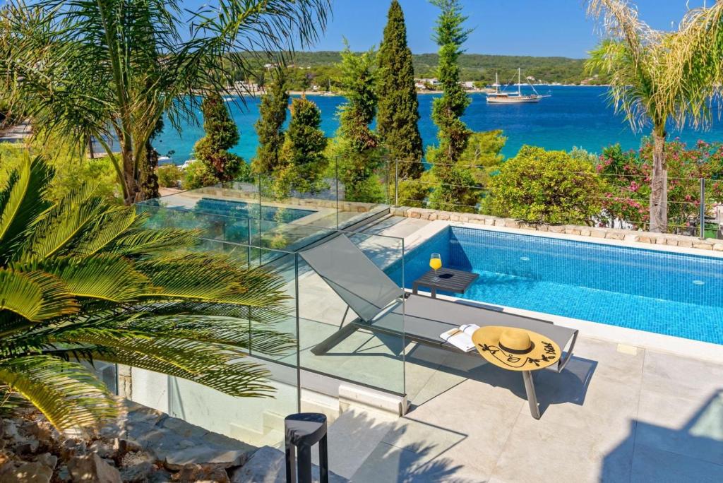 Luxury Beachfront Villa Raquel Solta with private pool and gym photo 1