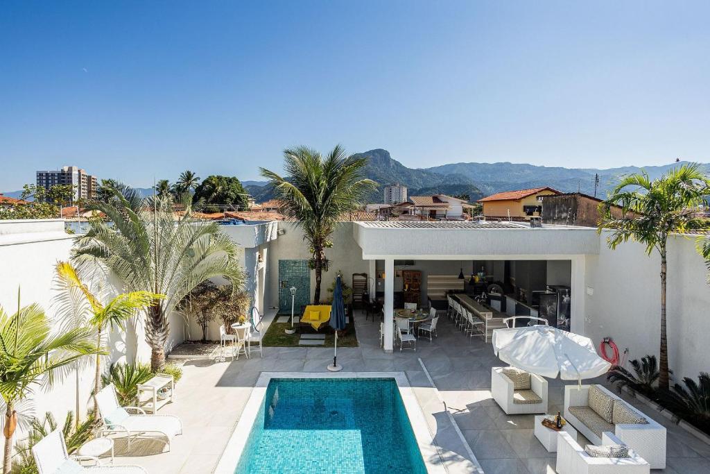 Casa com piscina e churrasqueira perto da praia photo 2