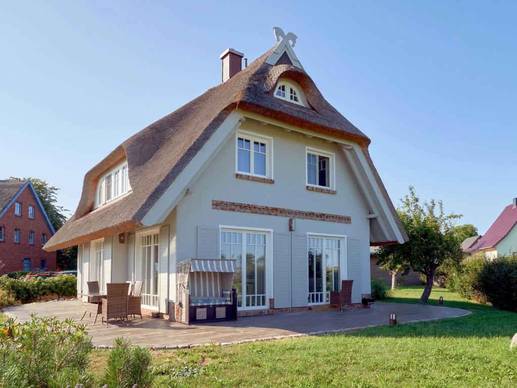 Reethus Reddevitz F 402 mit Kamin, Sauna, Terrasse, Boddenblick photo 1