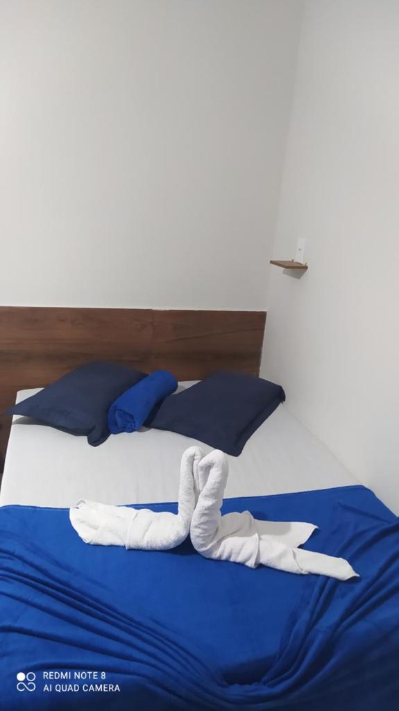 Quarto com frigobar,ar e garagem gratuita photo 1