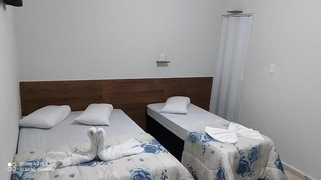 Quarto com tv,ar,frigobar,wifi e garagem photo 2