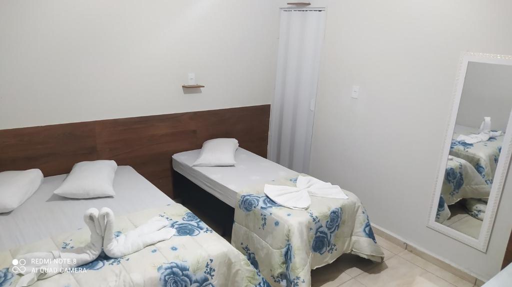 Quarto com tv,ar,frigobar,wifi e garagem photo 3