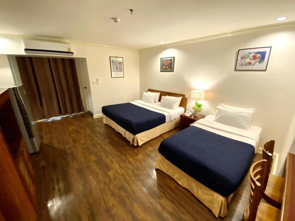 Трехместный (Трехместный номер Делюкс), Отель The Victory Executive Residences Bangkok